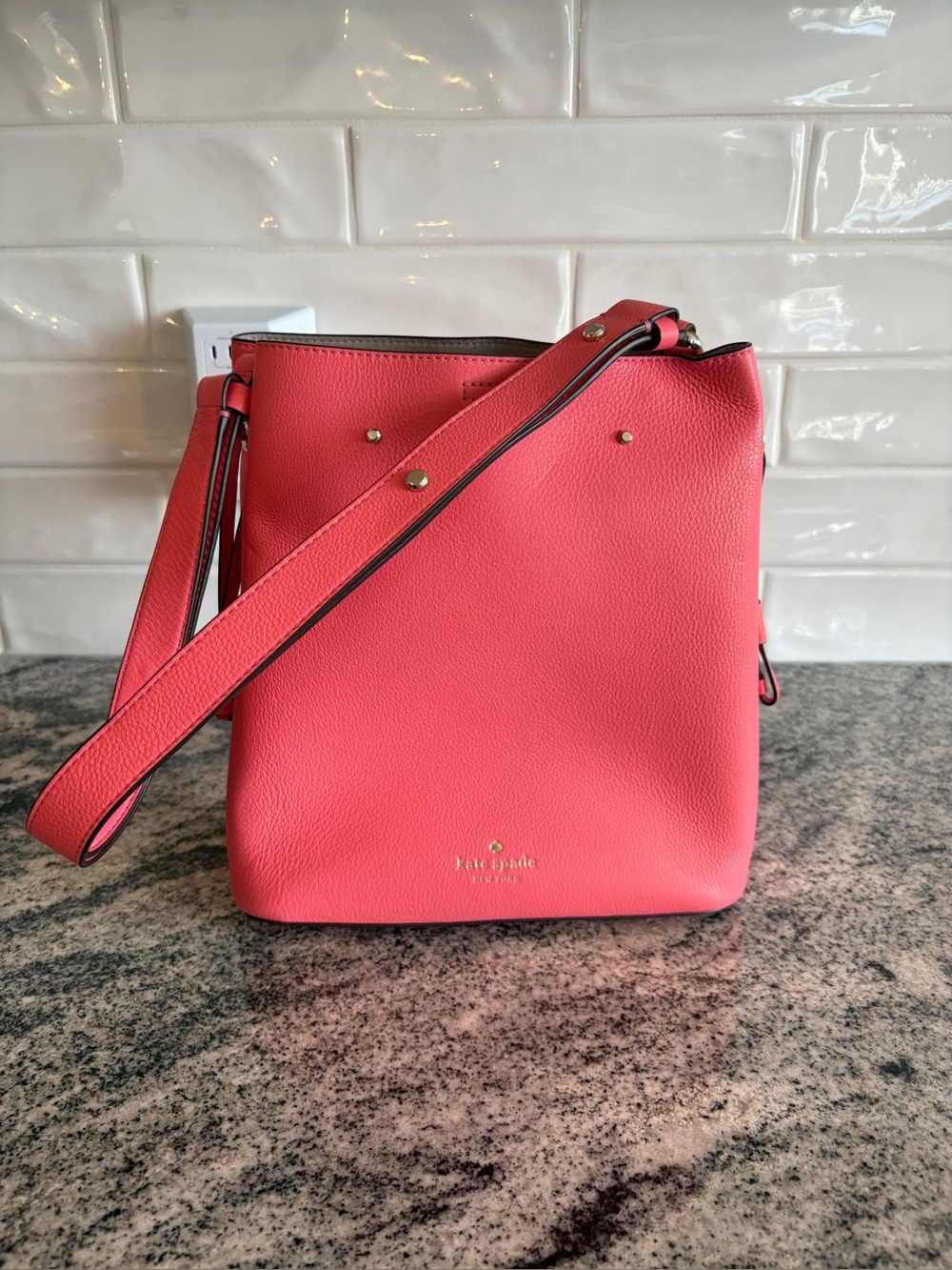kate spade coral pink pebbled leather crossbody bag